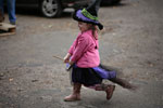 [Emily on her broomstick]